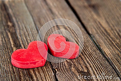 Wooden background with heart. Love theme, valentine. Desk Stock Photo