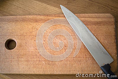 There is a knife on the board Stock Photo