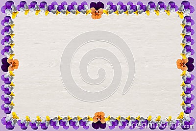 Wooden background with violas frame Stock Photo