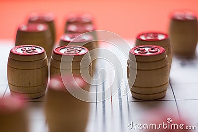 Wooden barrels for playing lotto on game cards, shallow depth of field, some details are out of focus. Editorial Stock Photo