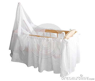 Wooden Bassinet with White Drapes Stock Photo