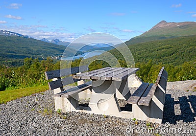 Wooden bench against the Norwegian fjord Stock Photo