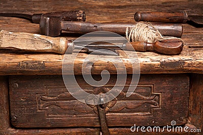 Wooden bench and rusty tools Stock Photo