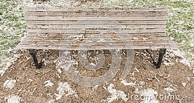 Wooden bench surrounded by blossom Stock Photo