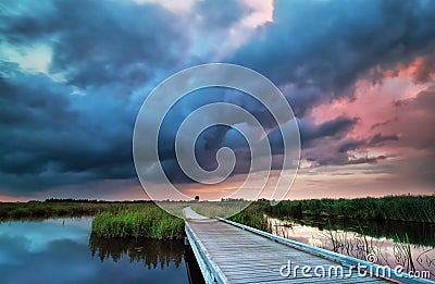 Wooden bike road on water and storm Stock Photo