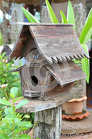 Wooden bird houses in the garden Stock Photo