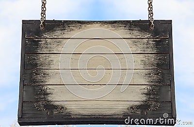 Wooden blank sign hanging with metal chains, copy space Stock Photo