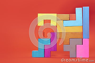 Wooden block puzzle. wood cube stacking. Concept of complex and smart logical thinking. Slightly defocused and close up Stock Photo