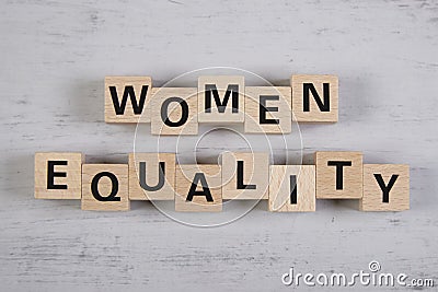 wooden blocks building the word women equality Stock Photo