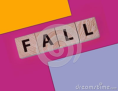 Wooden blocks with Fall word. economy financial crisis business concept Stock Photo