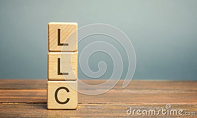Wooden blocks with LLC - Limited Liability Company. Business concept. Hybrid companies that combine the characteristics of a Stock Photo