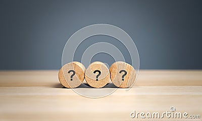 Wooden blocks with a question mark. Asking questions, searching for truth. Riddle mystery, investigation and research. FAQ - Stock Photo
