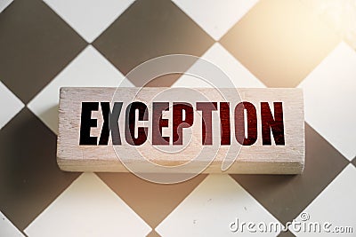 Wooden Blocks with the text: Exception. Outstanding abnormal breaking the rules business concept Stock Photo