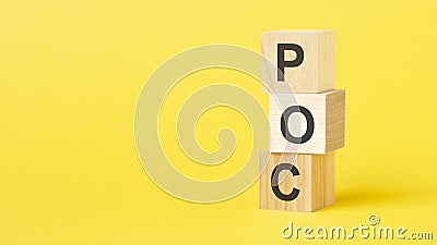 wooden blocks with the text POC - short for Proof of Concept on a bright yellow background Stock Photo