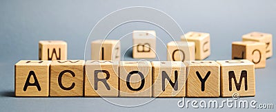 Wooden blocks with the word Acronym. Abbreviation from the initial components of a phrase or a word Stock Photo