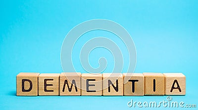 Wooden blocks with the word Dementia. Decrease in cognitive activity and memory. Emotional problems, decrease in motivation, Stock Photo
