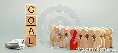 Wooden blocks with the word Goal, money and business team. Business concept. Cooperation and teamwork. Improving the efficiency of Stock Photo