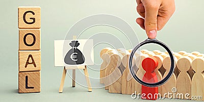 Wooden blocks with the word Goal, money and business team. Business concept. Cooperation and teamwork. Improving the efficiency of Stock Photo