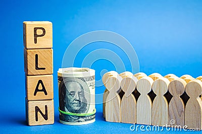 Wooden blocks with the word Plan and a business team standing next to money. Strategy planning. Management business concept. Stock Photo