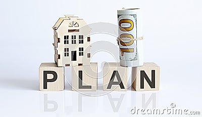 Wooden blocks with the word For PLAN Real estate concept. Rent apartment Stock Photo