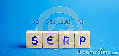 Wooden blocks with the word SERP - Search Engine Results Page. Pages displayed by search engines in response to a query by a user Stock Photo