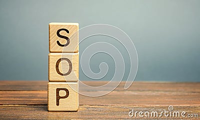 Wooden blocks with the word SOP Standard operating procedure . Instructions to assist employees in complex routine operations. Stock Photo