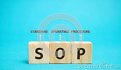 Wooden blocks with the word SOP Standard operating procedure . Instructions to assist employees in complex routine operations. Stock Photo