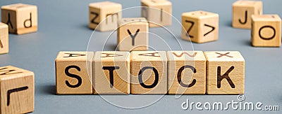 Wooden blocks with the word Stock. Trading on the stock exchange. Investment portfolio. Capital gains. Common and preferred stocks Stock Photo