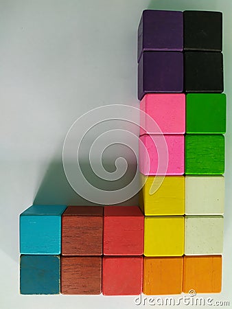 Wooden blog square grid.Sticks to painted colorful to array different levels to create dimensions for decorated on the wall in tha Stock Photo