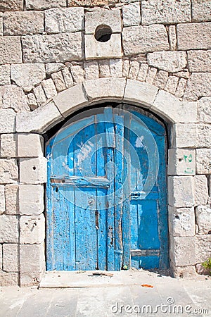 Wooden blue door in Madaba Stock Photo