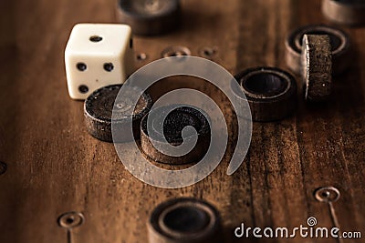 Wooden Board with backgammon, pawns, dice, close up Stock Photo