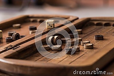 Wooden Board with backgammon, pawns, dice, close up Stock Photo