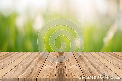 Wooden board empty table blur trees in forest background. Stock Photo