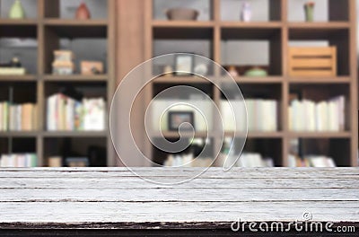 Wooden board empty table space platform in front of blurred library Of The background - can be used for display or montage your p Stock Photo