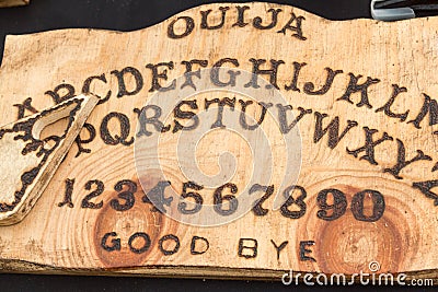 Wooden Board Ouija: Communication with Spirits Stock Photo