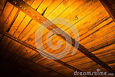 Wooden boards in golden lighting as background Stock Photo