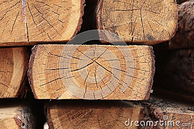 Wooden boards in warehouse of building materials. Wooden building materials.Stacks of lumber are stored in warehouse Stock Photo