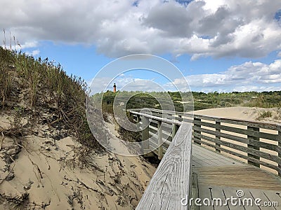 Wooden boardwalk leading to the beach Stock Photo