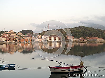 Wooden Boat at Sella river Ribadesella, Asturias, Spain at dusk Editorial Stock Photo