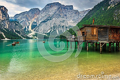 Wooden boathouse on the alpine lake,Dolomites,Italy,Europe Stock Photo