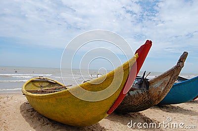 Wooden boats on the beach in Quy Nhon, Vietnam Stock Photo