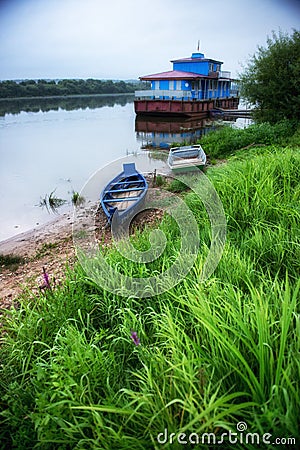 Wooden boats at sunrise at Russian town Tarusa. Stock Photo