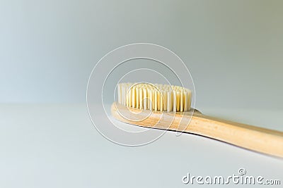 Wooden body brush on white background. Home massager. Shower brush Stock Photo