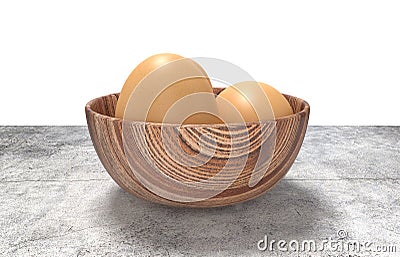 Wooden bowl ful of eggs. Placed on concrete table. Stock Photo