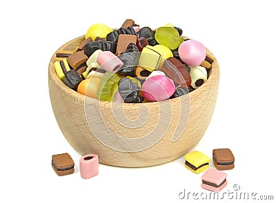 A wooden bowl of mixed sweets Stock Photo