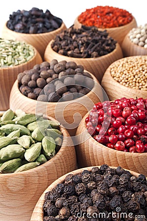 Wooden bowls full of different spices Stock Photo