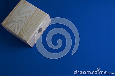 Wooden box on blue mat background for secrets. The wishes Stock Photo