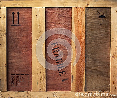 Wooden box with fragile and freight signs Stock Photo