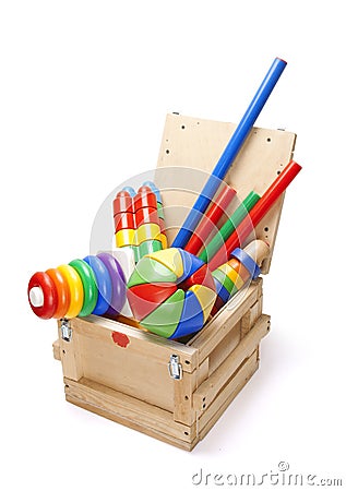 Wooden box with many toys Stock Photo