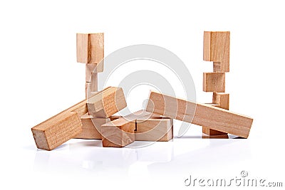 Wooden brain teaser on white Stock Photo